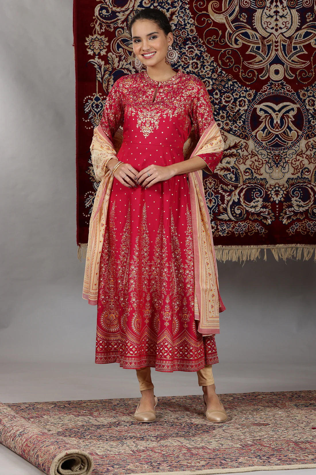 Stylish Pink Flared Kurta Set with Printed Design, Embellished Neck Detailing, Matching Tights, and Dupatta for Special Occasions