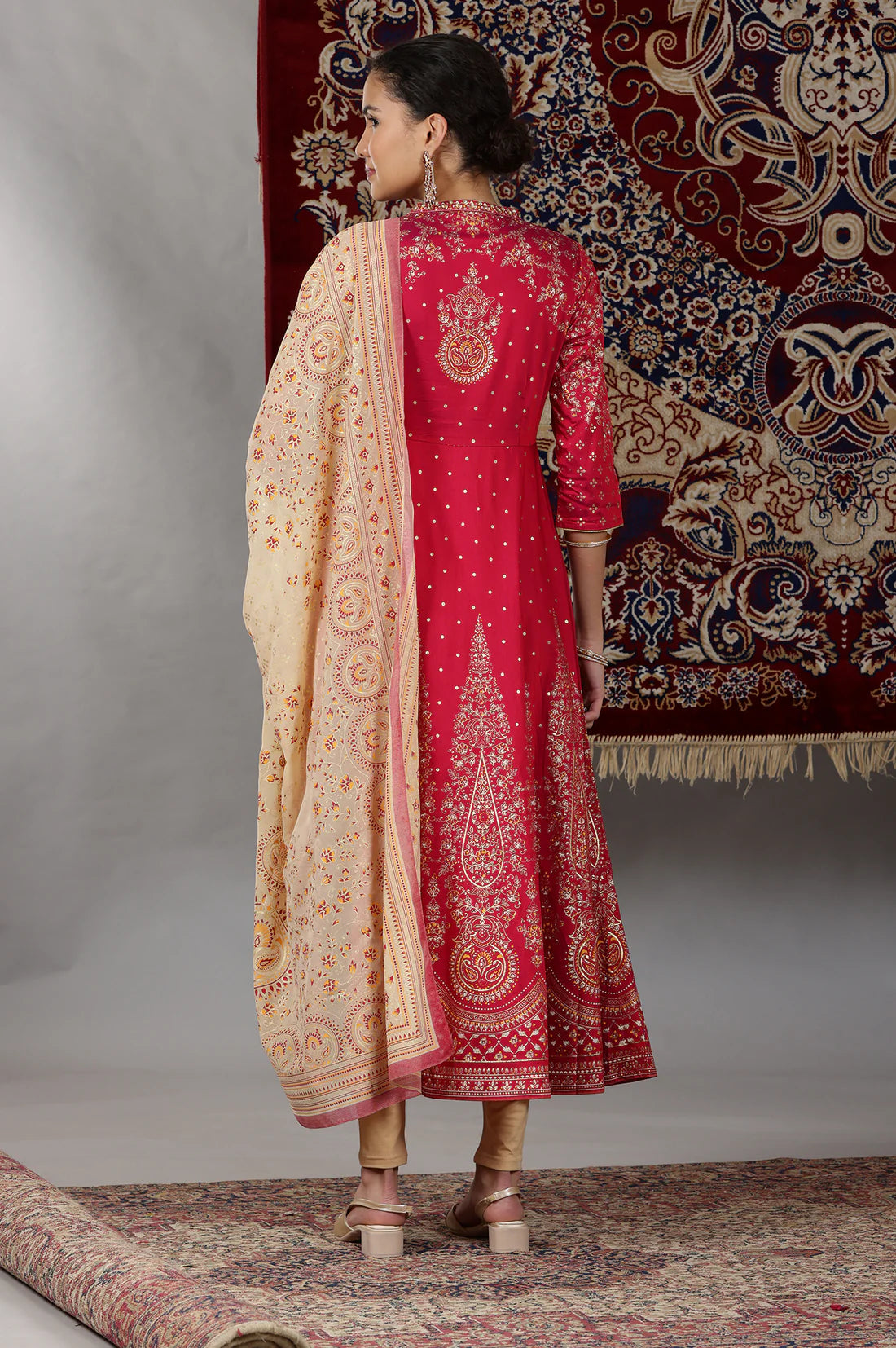 Stylish Pink Flared Kurta Set with Printed Design, Embellished Neck Detailing, Matching Tights, and Dupatta for Special Occasions