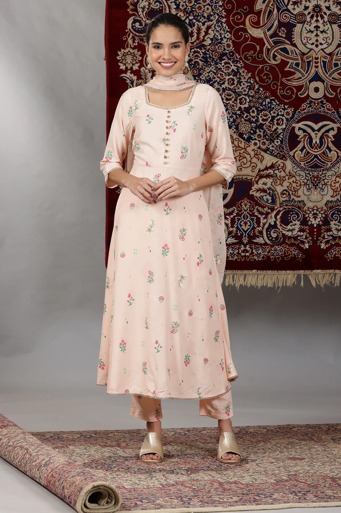 Elegant Light Peach Flared Kurta Set with Floral Prints and Lace Detailing, Coordinated Pants, and Matching Dupatta