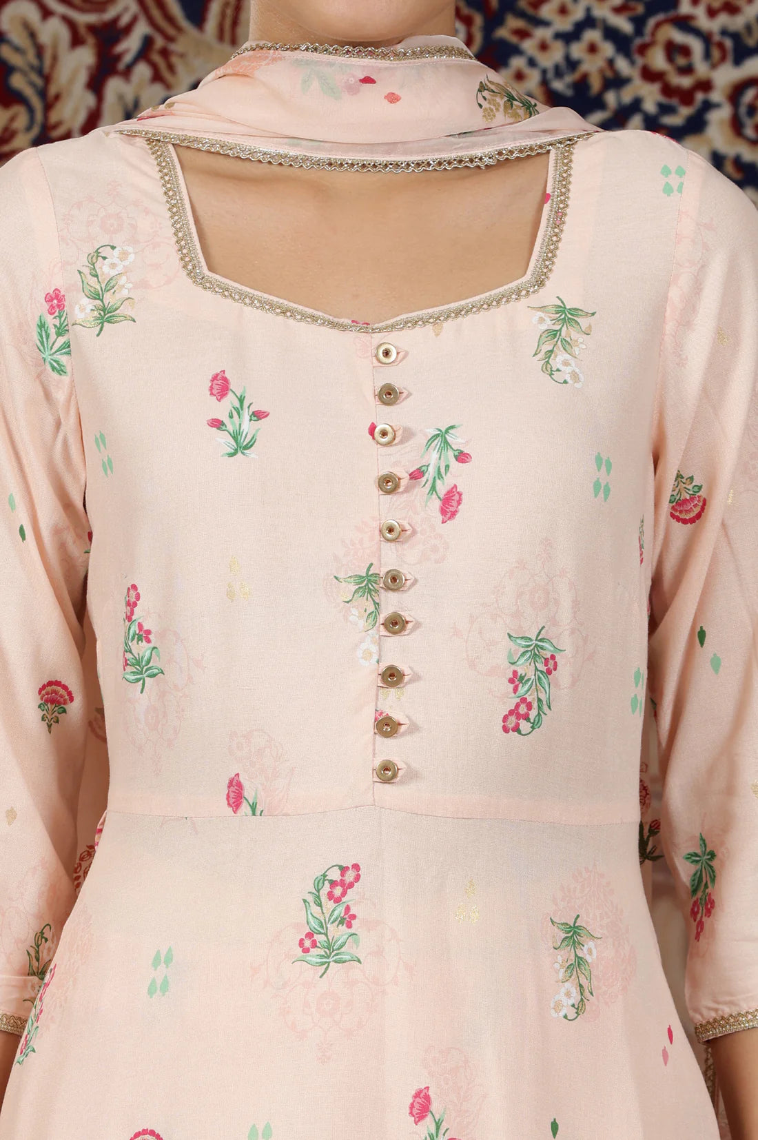 Elegant Light Peach Flared Kurta Set with Floral Prints and Lace Detailing, Coordinated Pants, and Matching Dupatta