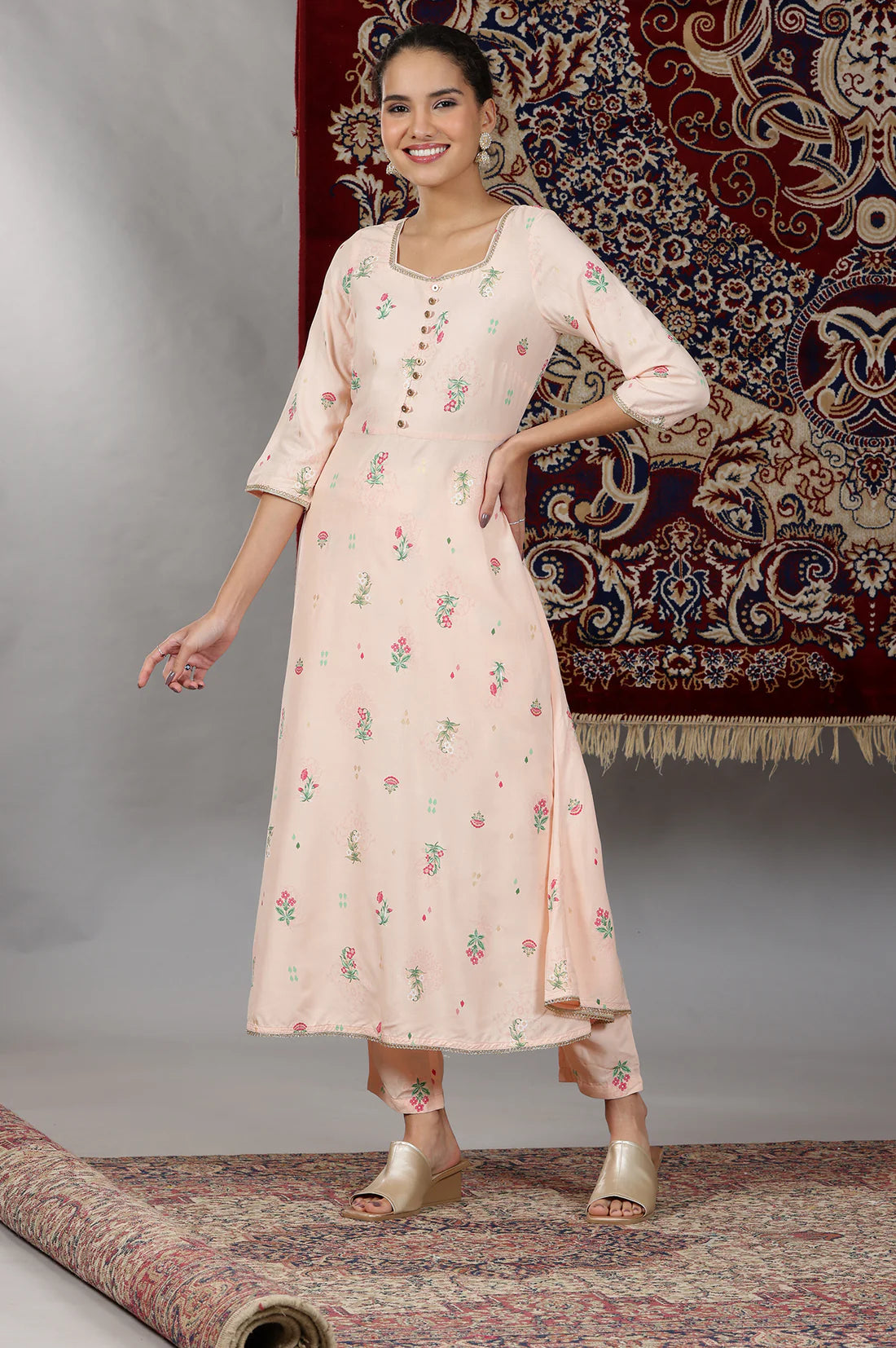 Elegant Light Peach Flared Kurta Set with Floral Prints and Lace Detailing, Coordinated Pants, and Matching Dupatta