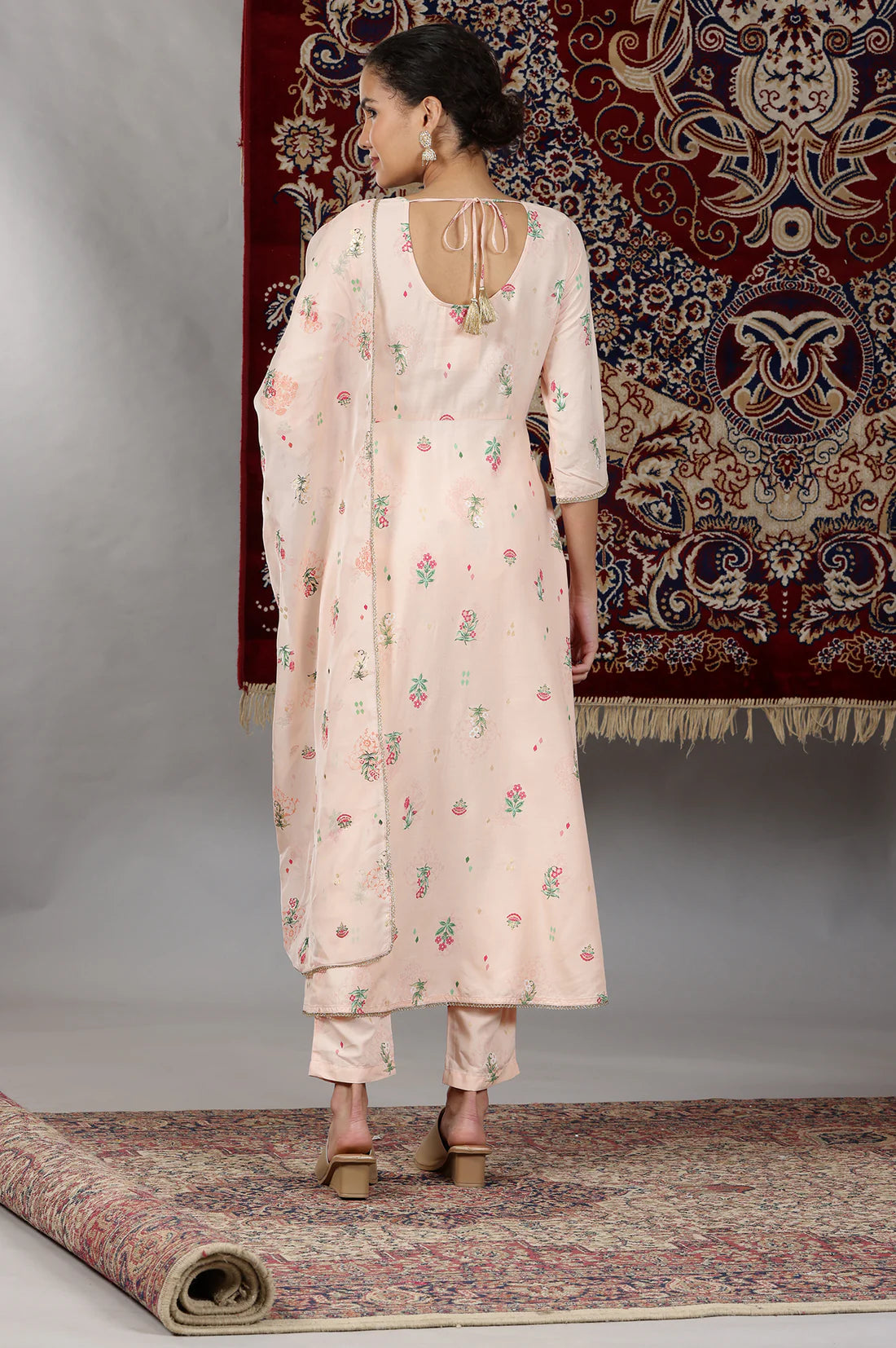Elegant Light Peach Flared Kurta Set with Floral Prints and Lace Detailing, Coordinated Pants, and Matching Dupatta