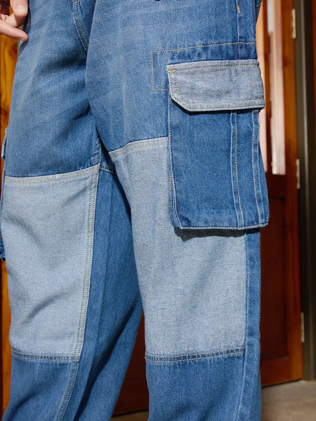 Trendy Blue Denim Cargo Jeans with Eye-Catching Colour-Blocked Design for Men