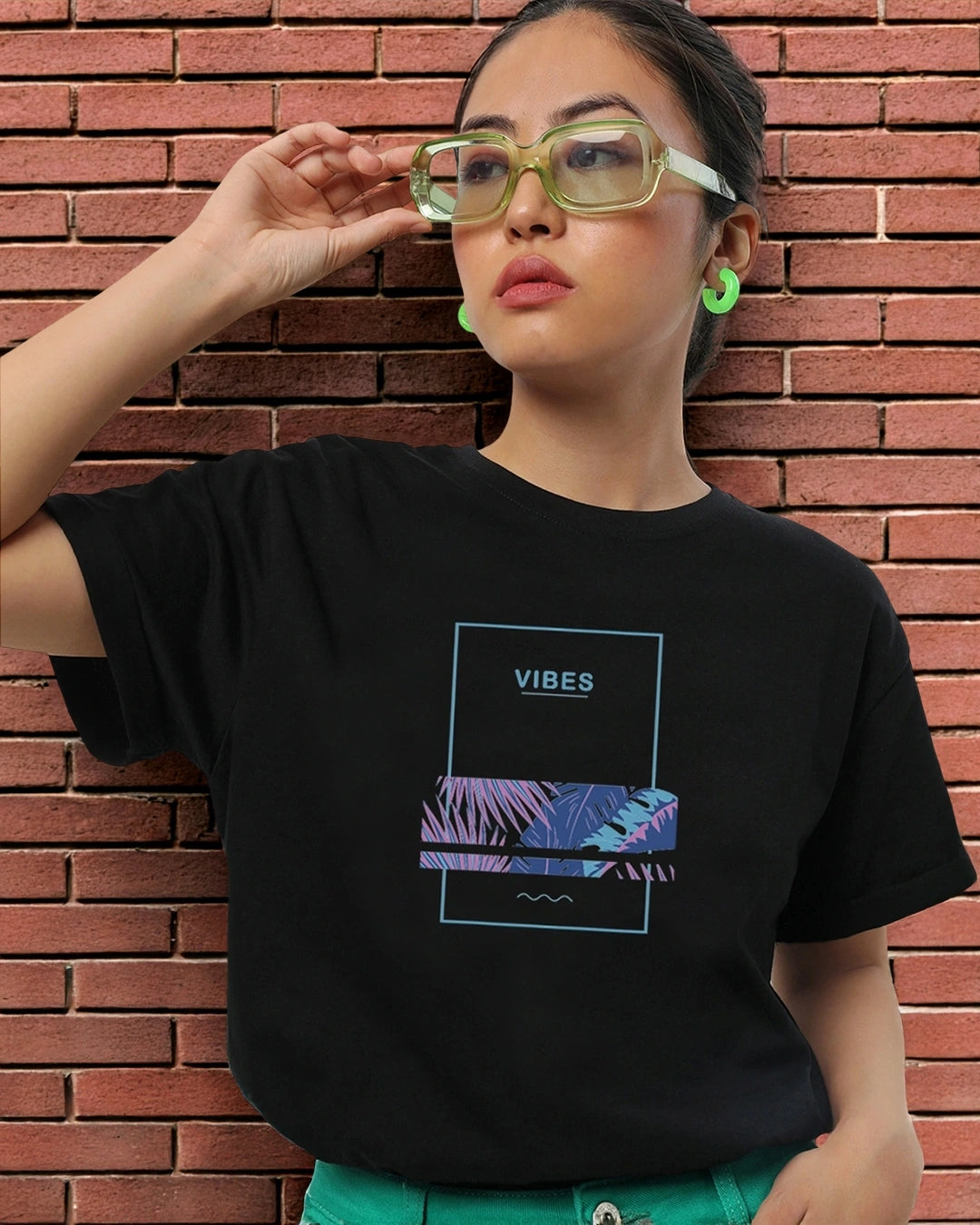 Fashionable Black Boyfriend T-Shirt for Women with Eye-Catching Blue Vibes Graphic Print