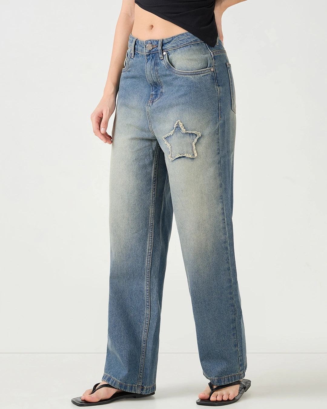 Rugged Yet Stylish Women’s Blue Washed Straight Fit Distressed Denim Perfect for Work and Play