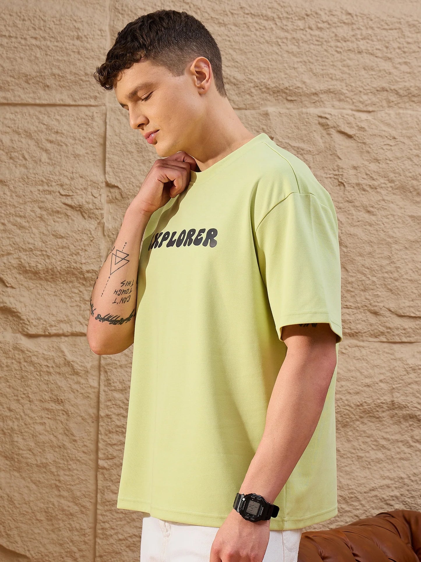 Fashionable Men’s Oversized Green T-Shirt with Round Neck and Relaxed Styling