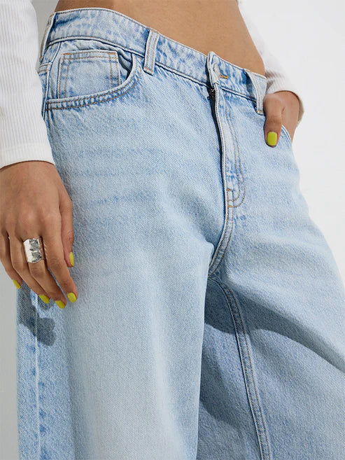 Premium Quality Blue Faded Low Rise Relaxed Fit Denim Jeans for Women Offering Modern Street Style