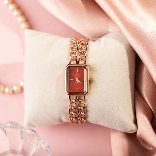 Fashionable Women’s Red Dial Analog Watch Rose Gold Accented Sleek Design
