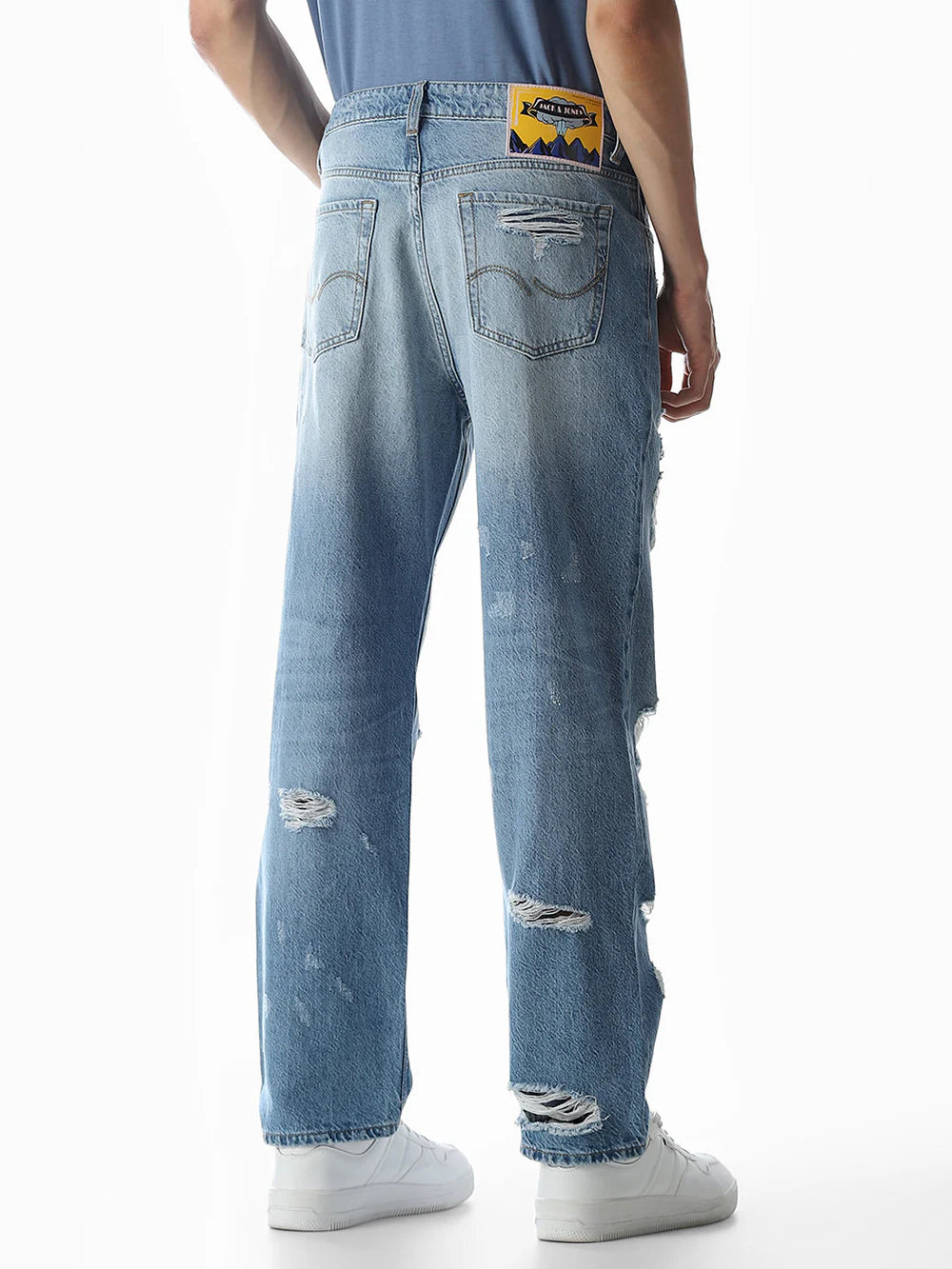 Men’s Relaxed-Fit Denim Jeans in Light Blue with Heavy Distressing and Loose-Fit Design