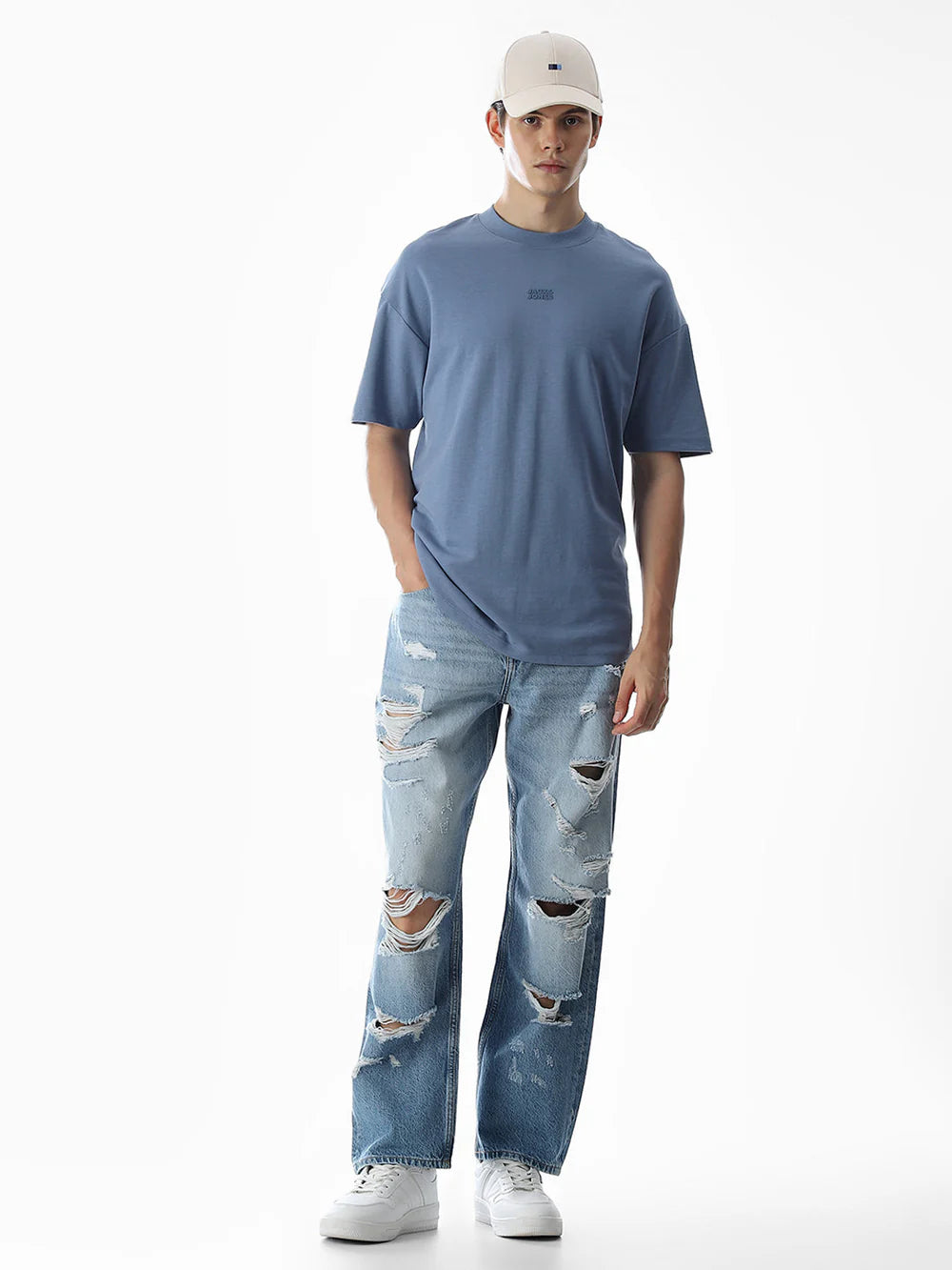 Men’s Relaxed-Fit Denim Jeans in Light Blue with Heavy Distressing and Loose-Fit Design