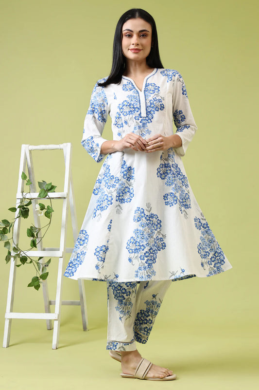 Comfortable Women’s White Cotton Kurta and Pants Set with Flared Design and Floral Print for Casual and Festive Occasions