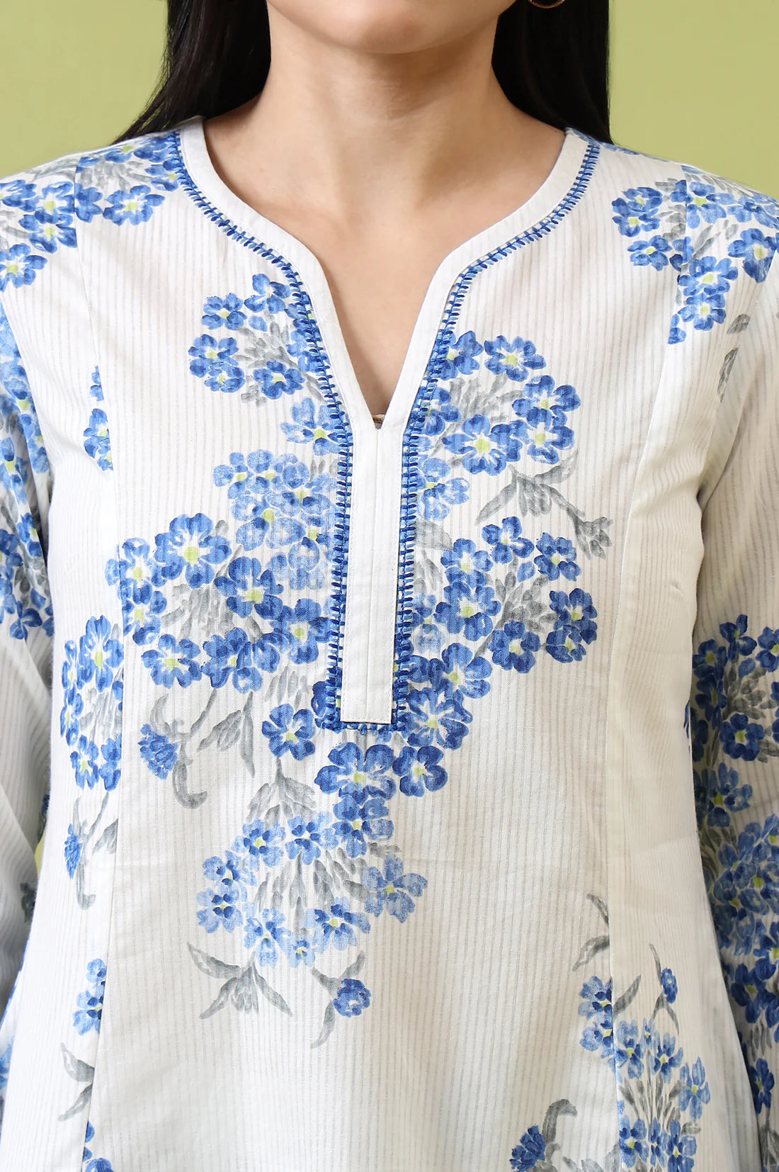 Comfortable Women’s White Cotton Kurta and Pants Set with Flared Design and Floral Print for Casual and Festive Occasions