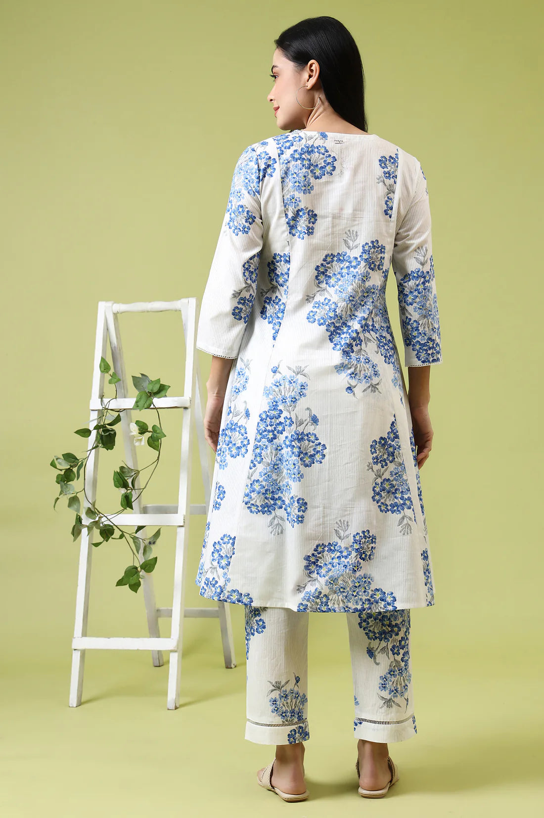 Comfortable Women’s White Cotton Kurta and Pants Set with Flared Design and Floral Print for Casual and Festive Occasions