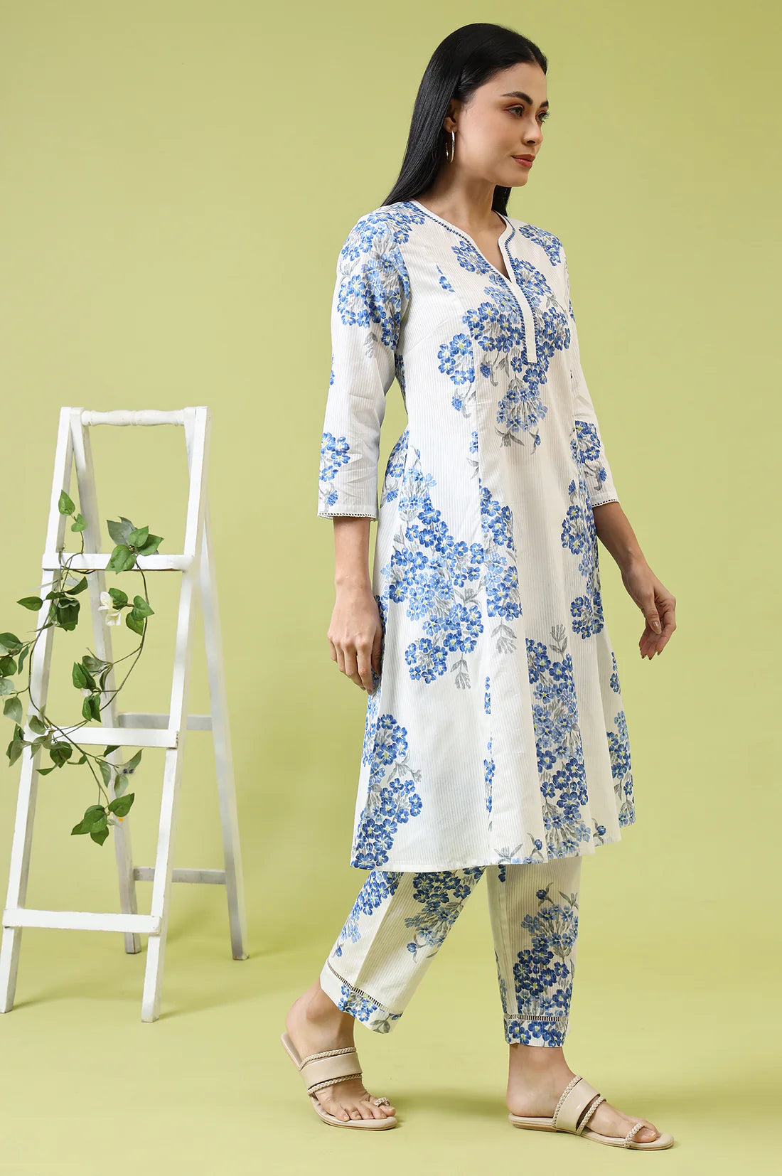 Comfortable Women’s White Cotton Kurta and Pants Set with Flared Design and Floral Print for Casual and Festive Occasions