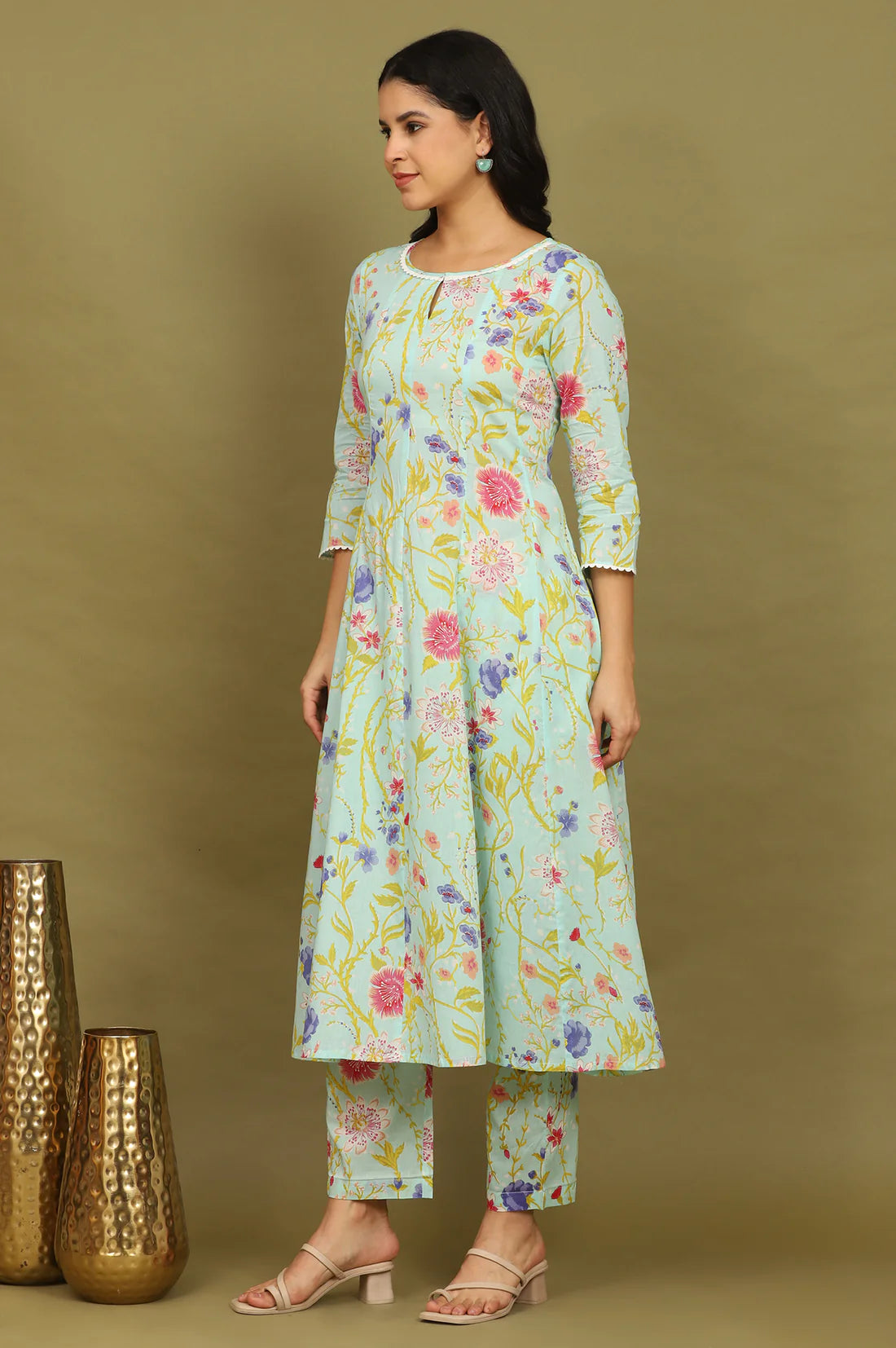 Trendy Light Turquoise Blue Cotton Flared Kurta and Pants Set with Matching Dupatta and Delicate Floral Prints for Women