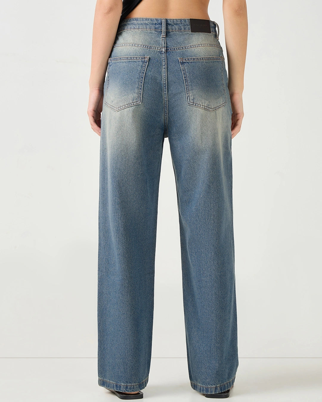 Rugged Yet Stylish Women’s Blue Washed Straight Fit Distressed Denim Perfect for Work and Play